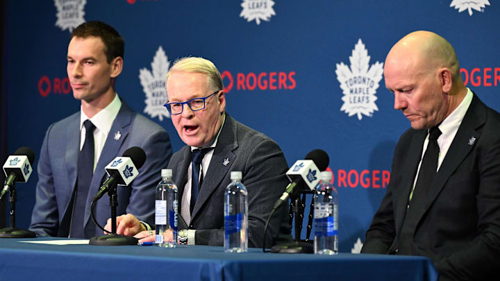May 4, 2026; Toronto, Ontario, CANADA;  Maple Leafs Sports and Entertainment CEO Keith Pelley answers media questions between Toronto Maple Leafs general manager John Chayka (left) and senior executive advisor Mats Sundin during an introductory news conference at Real Sports Bar and Grill. Mandatory Credit: Dan Hamilton-Imagn Images