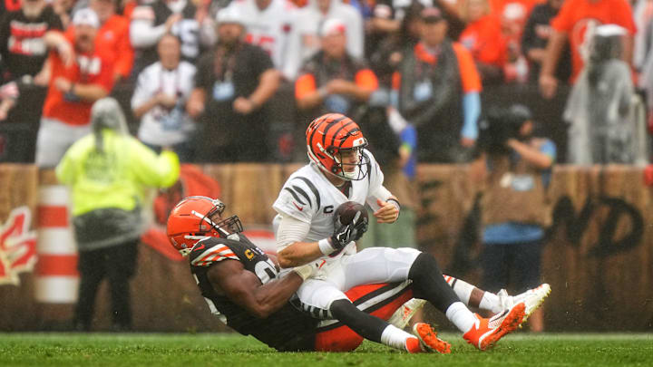 Cleveland Browns defensive end Myles Garrett (95) sacks Cincinnati Bengals quarterback Joe Burrow (9) in the fourth quarter of an NFL football game between the Cincinnati Bengals and Cleveland Browns, Sunday, Sept. 10, 2023, at Cleveland Browns Stadium in Cleveland.