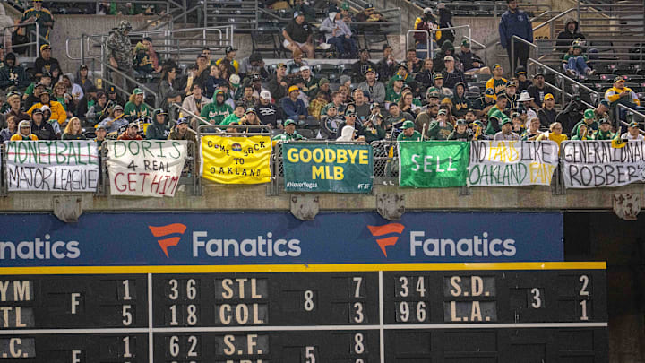 Sep 24, 2024; Oakland, California, USA; Oakland Athletics fans in the right field bleachers during the game against the Texas Rangers during the fifth inning at Oakland-Alameda County Coliseum. Mandatory Credit: Neville E. Guard-Imagn Images