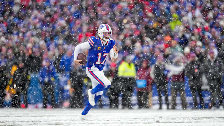 Buffalo Bills quarterback Josh Allen (17) breaks away for a touchdown run in the fourth quarter at Highmark Stadium in Orchard Park, N.Y., on Sunday, Dec. 7, 2025. Buffalo Bills quarterback Josh Allen (17) breaks away for a touchdown run in the fourth quarter at Highmark Stadium in Orchard Park, N.Y., on Sunday, Dec. 7, 2025.