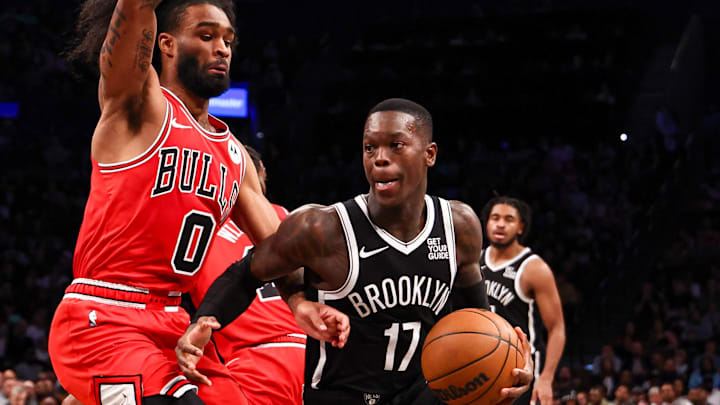 Nov 1, 2024; Brooklyn, New York, USA; Brooklyn Nets guard Dennis Schroder (17) dribbles against Chicago Bulls guard Coby White (0) during the second half at Barclays Center. Mandatory Credit: Vincent Carchietta-Imagn Images