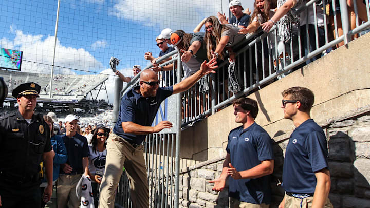 Penn State football coach James Franklin celebrates with the students following a Nittany Lions win at Beaver Stadium.
