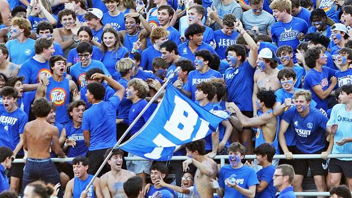 Jesuit’s student section cheers during a home football game at Alumni Field. Jesuit’s student section cheers during a home football game at Alumni Field.
