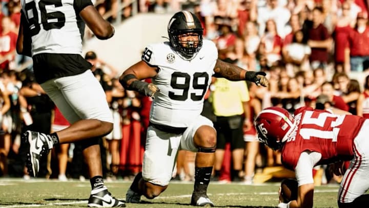 Josh Singh celebrates sacking Alabama quarterback Ty Simpson Josh Singh celebrates sacking Alabama quarterback Ty Simpson