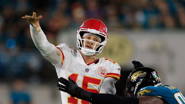 Kansas City Chiefs quarterback Patrick Mahomes (15) is pressured by Jacksonville Jaguars defensive end Emmanuel Ogbah (90) during the fourth quarter of an NFL football matchup at EverBank Stadium, Monday, Oct. 6, 2025, in Jacksonville, Fla. The Jacksonville Jaguars edged the Kansas City Chiefs 31-28. [Corey Perrine/Florida Times-Union]