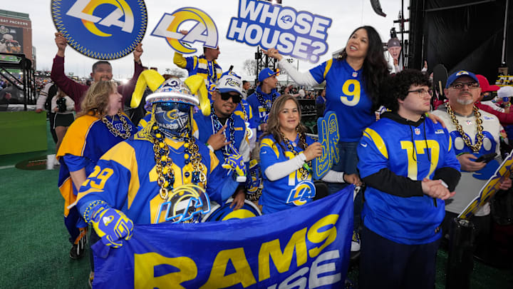 Apr 24, 2025; Green Bay, WI, USA;  Los Angeles Rams fans cheer before the first round of the 2025 NFL Draft at Lambeau Field. Mandatory Credit: Kirby Lee-Imagn Images