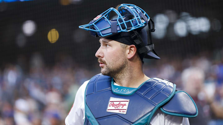 Sep 23, 2025; Seattle, Washington, USA; Seattle Mariners catcher Cal Raleigh (29) stands outside the dugout before a game against the Colorado Rockies at T-Mobile Park. Mandatory Credit: Joe Nicholson-Imagn Images Sep 23, 2025; Seattle, Washington, USA; Seattle Mariners catcher Cal Raleigh (29) stands outside the dugout before a game against the Colorado Rockies at T-Mobile Park. Mandatory Credit: Joe Nicholson-Imagn Images