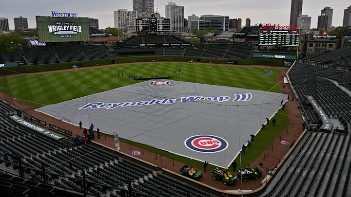 May 3, 2026; Chicago, Illinois, USA; A general wide view of the rain tarp over the field prior to a game between the Chicago Cubs and the Arizona Diamondbacks at Wrigley Field. Mandatory Credit: Patrick Gorski-Imagn Images