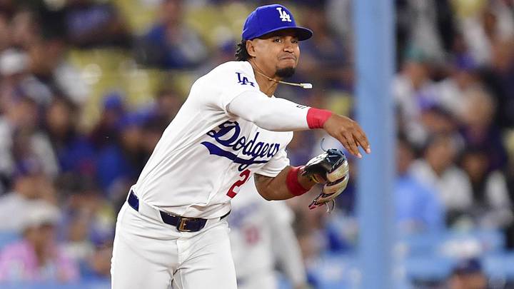 May 13, 2026; Los Angeles, California, USA; Los Angeles Dodgers third baseman Santiago Espinal (21) throws to first in the ninth inning against the San Francisco Giants at Dodger Stadium. Mandatory Credit: Gary A. Vasquez-Imagn Images May 13, 2026; Los Angeles, California, USA; Los Angeles Dodgers third baseman Santiago Espinal (21) throws to first in the ninth inning against the San Francisco Giants at Dodger Stadium. Mandatory Credit: Gary A. Vasquez-Imagn Images