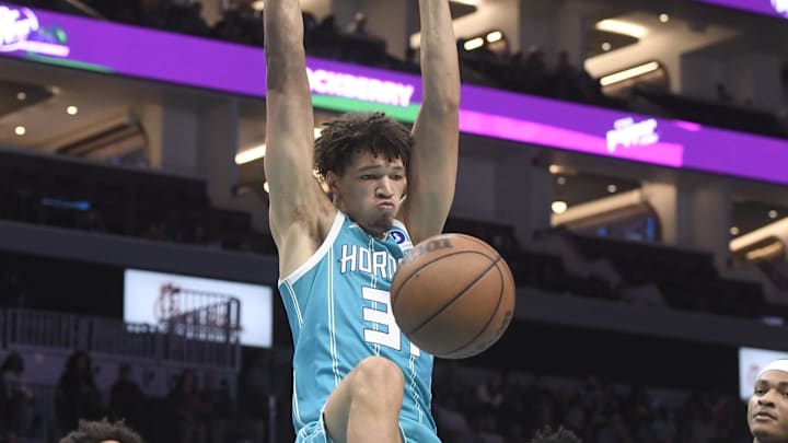 Oct 22, 2025; Charlotte, North Carolina, USA; Charlotte Hornets forward Tidjane Salaun (31) dunks during the second half against the Brooklyn Nets at the Spectrum Center. Mandatory Credit: Sam Sharpe-Imagn Images