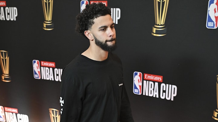 Dec 17, 2024; Las Vegas, NV, USA; Oklahoma City Thunder guard Ajay Mitchell (25) arrives at the Emirates NBA Cup-Red Carpet before their game against the Milwaukee Bucks at T-Mobile Arena. Mandatory Credit: Candice Ward-Imagn Images