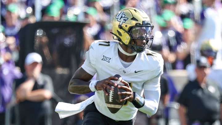 3Sep 27, 2025; Manhattan, Kansas, USA; UCF Knights quarterback Jacurri Brown (11) drops back to pass during the second quarter against the Kansas State Wildcats at Bill Snyder Family Football Stadium. Mandatory Credit: Scott Sewell-Imagn Images 3Sep 27, 2025; Manhattan, Kansas, USA; UCF Knights quarterback Jacurri Brown (11) drops back to pass during the second quarter against the Kansas State Wildcats at Bill Snyder Family Football Stadium. Mandatory Credit: Scott Sewell-Imagn Images