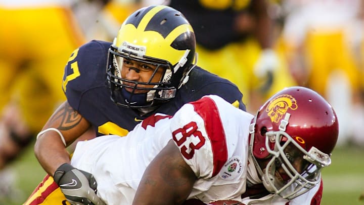 Jan 1, 2007; Pasadena, CA, USA: FILE PHOTO; Southern California Trojans tight end Fred Davis (83) in action against Michigan Wolverines linebacker Chris Graham (37) during the 2007 Rose Bowl at the Rose Bowl. The Trojans defeated the Wolverines 32-18. Mandatory Credit: Richard Mackson-USA TODAY Network