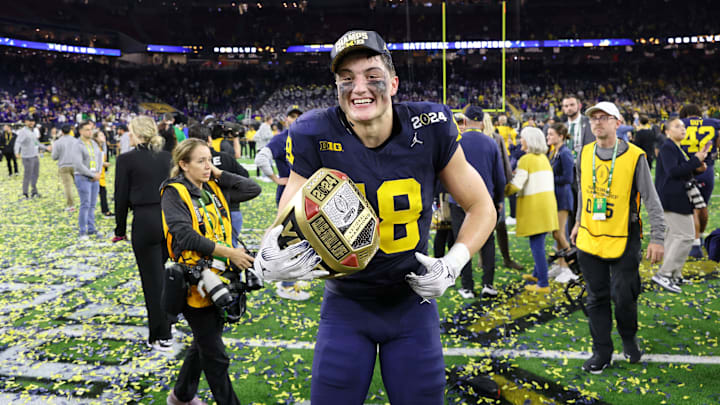 Jan 8, 2024; Houston, TX, USA; Michigan Wolverines tight end Colston Loveland (18) celebrates after winning 2024 College Football Playoff national championship game against the Washington Huskies at NRG Stadium. Mandatory Credit: Thomas Shea-Imagn Images