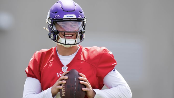 J.J. McCarthy during a summer offseason practice with the Vikings. J.J. McCarthy during a summer offseason practice with the Vikings.