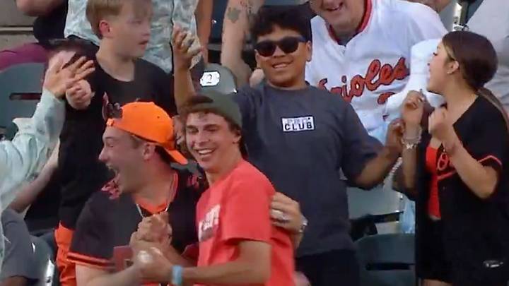 Baltimore fan defied the odds as two baseballs ended up in his hands during.