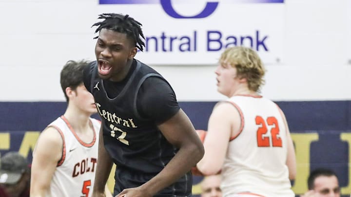 Little Rock Central's Annor Boateng (12) reacts after scoring two as the visiting Tigers beat the Colts 89-78 in double overtime at Thursday's 2023 Chad Gardner Law King of the Bluegrass holiday basketball tournament at Fairdale High School. LRC is Arkansas No.1-ranked team Dec. 21, 2023