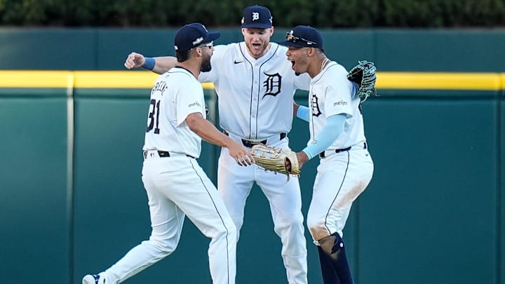 From left, Detroit Tigers left fielder Riley Greene (31), center fielder Parker Meadows (22) and right fielder Wenceel Pérez (46) celebrate 3-0 win over Cleveland Guardians at Game 3 of ALDS at Comerica Park in Detroit on Wednesday, Oct. 9, 2024.