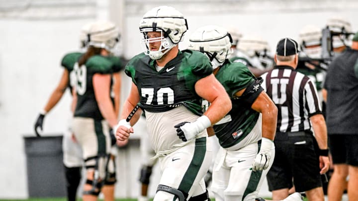 Michigan State's Luke Newman works out during camp on Monday, Aug. 5, 2024, at the indoor practice facility in East Lansing.