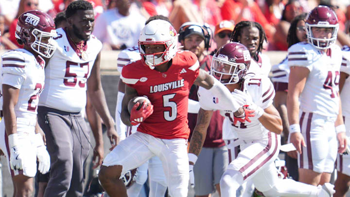Louisville Cardinals wide receiver Caullin Lacy (5) gains yardage during the Cards' 51-17 win over Eastern Kentucky University at the Cardinals' season opener Saturday, August 30, 2025 at L&N Federal Credit Union Stadium in Louisville, Kentucky.