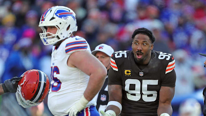 Cleveland Browns defensive end Myles Garrett (95) reacts after losing his helmet on a play during the second half of an NFL football game at Huntington Bank Field, Dec. 21, 2025, in Cleveland, Ohio.