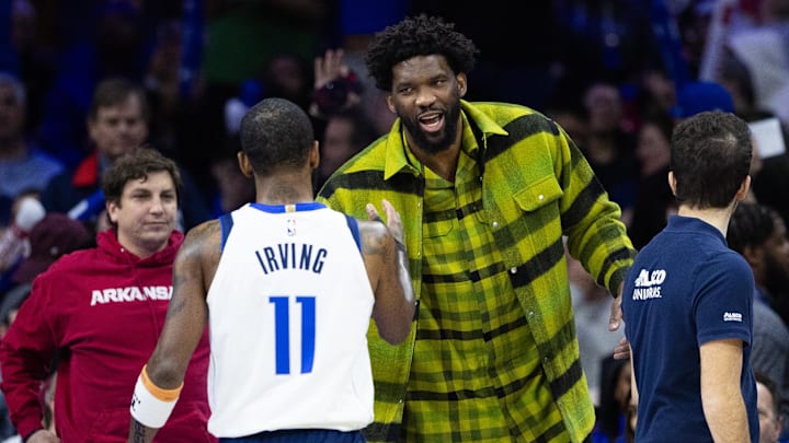 Feb 5, 2024; Philadelphia, Pennsylvania, USA; Philadelphia 76ers center Joel Embiid (R) talks with Dallas Mavericks guard Kyrie Irving (11) during a break in action in the fourth quarter at Wells Fargo Center. Mandatory Credit: Bill Streicher-Imagn Images Feb 5, 2024; Philadelphia, Pennsylvania, USA; Philadelphia 76ers center Joel Embiid (R) talks with Dallas Mavericks guard Kyrie Irving (11) during a break in action in the fourth quarter at Wells Fargo Center. Mandatory Credit: Bill Streicher-Imagn Images