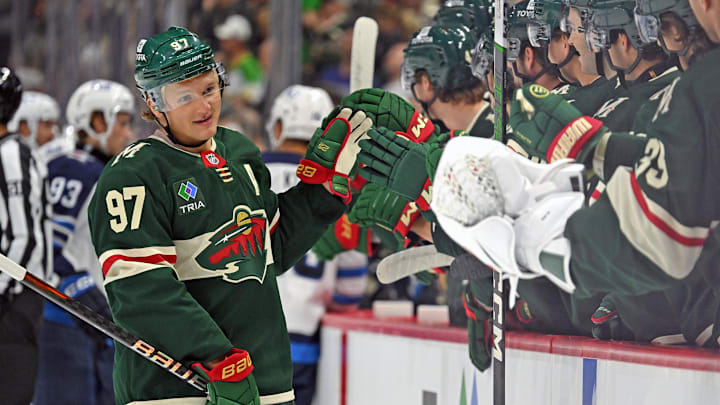 Sep 27, 2024; Saint Paul, Minnesota, USA;  Minnesota Wild forward Kirill Kaprizov (97) celebrates his power play goal against the Winnipeg Jets during the first period at Xcel Energy Center. Mandatory Credit: Nick Wosika-Imagn Images

