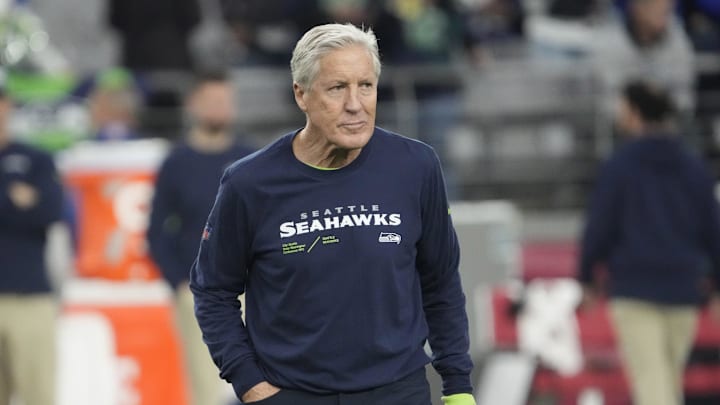 Seattle Seahawks head coach Pete Carroll watches his team warm up before playing against the Arizona Cardinals in Glendale on Jan. 7, 2024.