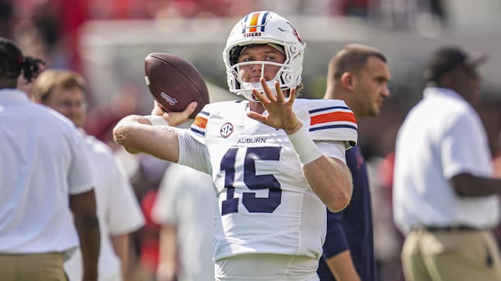 Oct 5, 2024; Athens, Georgia, USA; Auburn Tigers quarterback Hank Brown (15) shown warming up prior to the game against the Georgia Bulldogs at Sanford Stadium. Oct 5, 2024; Athens, Georgia, USA; Auburn Tigers quarterback Hank Brown (15) shown warming up prior to the game against the Georgia Bulldogs at Sanford Stadium.