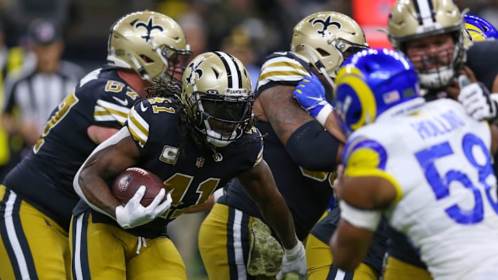 Nov 20, 2022; New Orleans, Louisiana, USA; New Orleans Saints running back Alvin Kamara (41) runs in the first quarter against the Los Angeles Rams at the Caesars Superdome. Mandatory Credit: Chuck Cook-Imagn Images