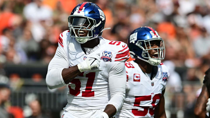 Sep 22, 2024; Cleveland, Ohio, USA; New York Giants linebacker Bobby Okereke (58) and New York Giants linebacker Azeez Ojulari (51) celebrate after a sack during the first quarter against the Cleveland Browns at Huntington Bank Field. Mandatory Credit: Ken Blaze-Imagn Images Sep 22, 2024; Cleveland, Ohio, USA; New York Giants linebacker Bobby Okereke (58) and New York Giants linebacker Azeez Ojulari (51) celebrate after a sack during the first quarter against the Cleveland Browns at Huntington Bank Field. Mandatory Credit: Ken Blaze-Imagn Images