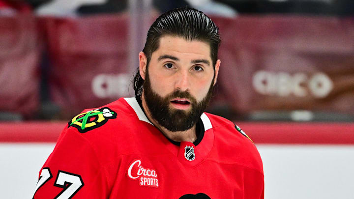 Nov 21, 2024; Chicago, Illinois, USA; Chicago Blackhawks left wing Pat Maroon (77) warms up against the Florida Panthers before the game at the United Center. Mandatory Credit: Daniel Bartel-Imagn Images