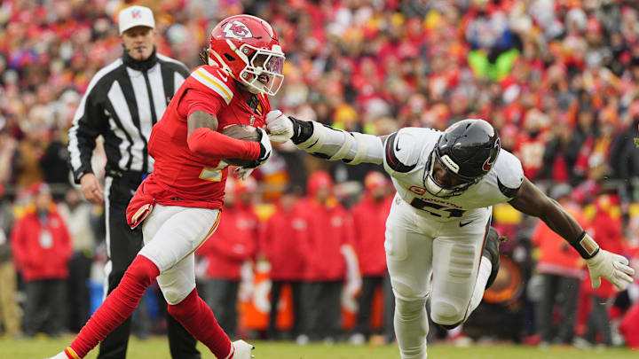Jan 18, 2025; Kansas City, Missouri, USA; Houston Texans defensive end Will Anderson Jr. (51) drags down Kansas City Chiefs wide receiver Xavier Worthy (1) during the first quarter of a 2025 AFC divisional round game at GEHA Field at Arrowhead Stadium. Mandatory Credit: Jay Biggerstaff-Imagn Images