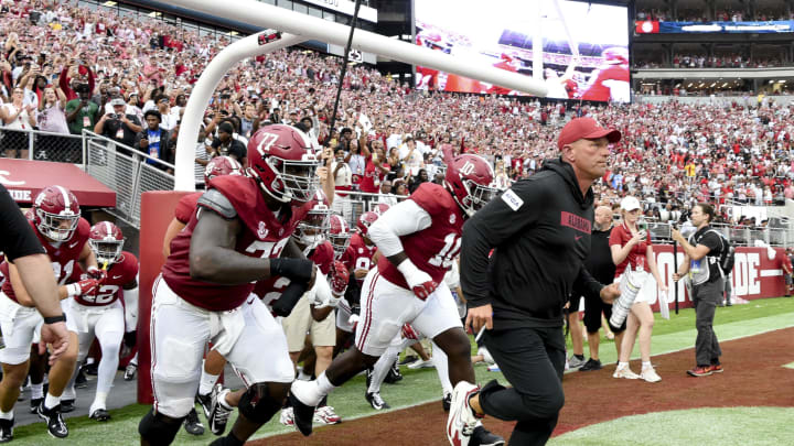 Aug 31, 2024; Tuscaloosa, Alabama, USA; Alabama Crimson Tide head coach Kalen DeBoer leads his players onto the field at Bryant-Denny Stadium for his first game as head coach. The Crimson Tide played Western Kentucky Hilltoppers. Mandatory Credit: Gary Cosby Jr.-USA TODAY Sports Aug 31, 2024; Tuscaloosa, Alabama, USA; Alabama Crimson Tide head coach Kalen DeBoer leads his players onto the field at Bryant-Denny Stadium for his first game as head coach. The Crimson Tide played Western Kentucky Hilltoppers. Mandatory Credit: Gary Cosby Jr.-USA TODAY Sports