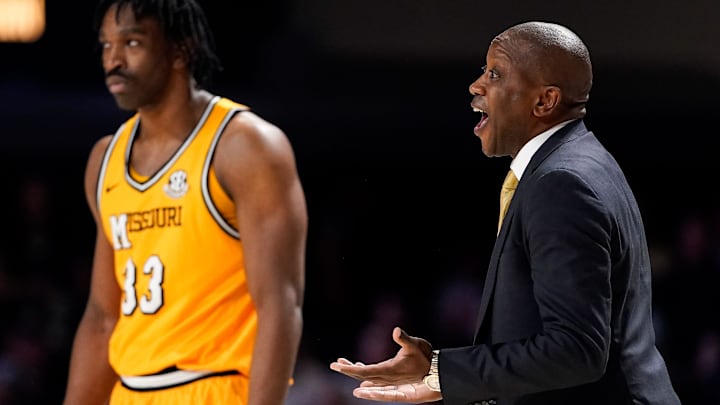 Missouri Tigers head coach Dennis Gates talks to his team from the sidelines, in a game versus the Kentucky Wildcats this season.