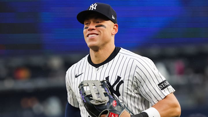 Apr 12, 2025; Bronx, New York, USA; New York Yankees outfielder Aaron Judge (99) reacts after catching a pop fly against the San Francisco Giants during the eighth inning at Yankee Stadium. 