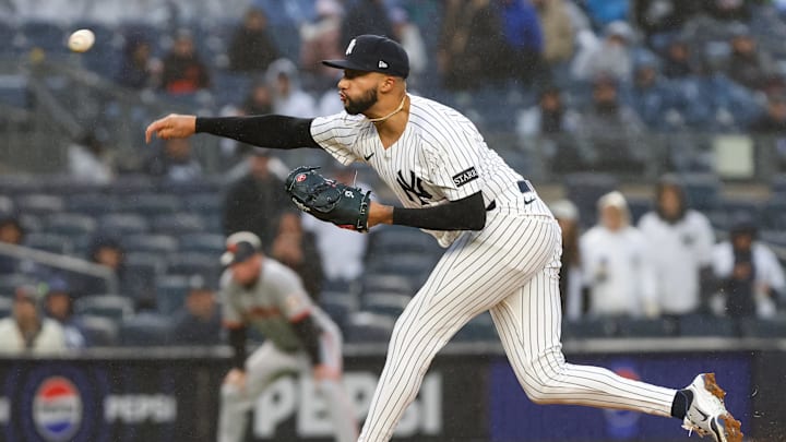 Apr 12, 2025; Bronx, New York, USA; New York Yankees pitcher Devin Williams (38) delivers a pitch against the San Francisco Giants during the ninth inning at Yankee Stadium.