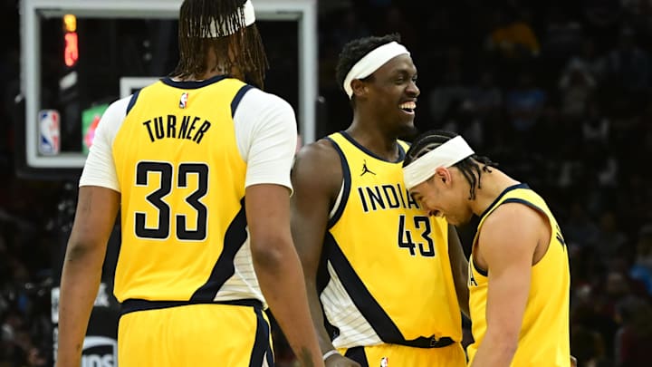 Jan 12, 2025; Cleveland, Ohio, USA; Indiana Pacers guard Andrew Nembhard (2) celebrates with forward Pascal Siakam (43) and center Myles Turner (33) after a basket during the second half against the Cleveland Cavaliers at Rocket Mortgage FieldHouse. Mandatory Credit: Ken Blaze-Imagn Images Jan 12, 2025; Cleveland, Ohio, USA; Indiana Pacers guard Andrew Nembhard (2) celebrates with forward Pascal Siakam (43) and center Myles Turner (33) after a basket during the second half against the Cleveland Cavaliers at Rocket Mortgage FieldHouse. Mandatory Credit: Ken Blaze-Imagn Images