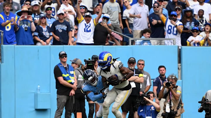 Sep 14, 2025; Nashville, Tennessee, USA; Los Angeles Rams wide receiver Davante Adams (17) catches a touchdown pass against the Tennessee Titans during the second half at Nissan Stadium. Mandatory Credit: Steve Roberts-Imagn Images