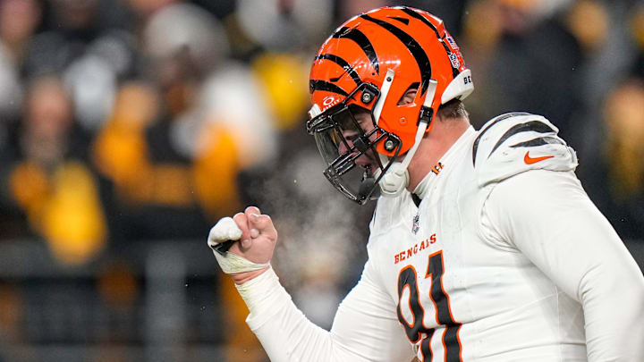 Cincinnati Bengals defensive end Trey Hendrickson (91) celebrates as the Steelers prepare to punt in the fourth quarter of the NFL Week 18 game between the Pittsburgh Steelers and the Cincinnati Bengals at Acrisure Stadium in Pittsburgh on Saturday, Jan. 4, 2025. The Bengals won 19-17 to finish the regular season at 9-8.