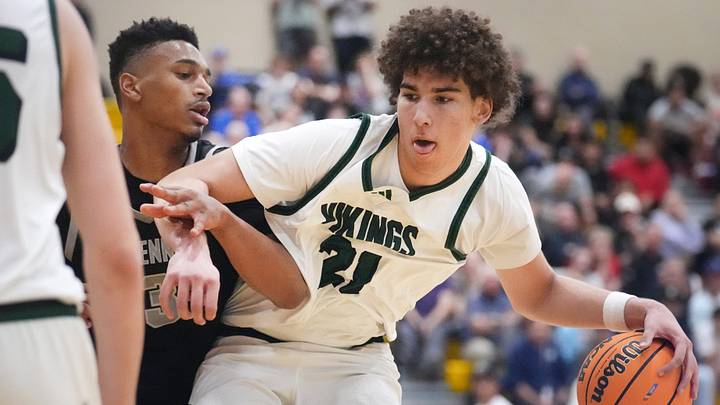 Millennium Tigers guard Cameron Holmes (3) defends Sunnyslope Vikings Darius Wabbington (21) during their Open Division boys basketball state semifinals game at Chaparral High School in Phoenix on March 5, 2025. Millennium Tigers guard Cameron Holmes (3) defends Sunnyslope Vikings Darius Wabbington (21) during their Open Division boys basketball state semifinals game at Chaparral High School in Phoenix on March 5, 2025.