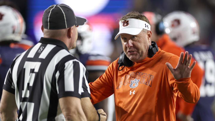 Nov 25, 2023; Auburn, Alabama, USA; Auburn Tigers head coach Hugh Freeze talks with game officials