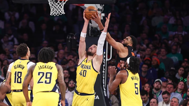 Mar 17, 2026; New York, New York, USA;  Indiana Pacers center Ivica Zubac (40) and New York Knicks center Karl-Anthony Towns (32) fight for a rebound in the second quarter at Madison Square Garden. Mandatory Credit: Wendell Cruz-Imagn Images