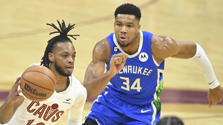 Dec 21, 2022; Cleveland, Ohio, USA; Cleveland Cavaliers guard Darius Garland (10) dribbles beside Milwaukee Bucks forward Giannis Antetokounmpo (34) in the first quarter at Rocket Mortgage FieldHouse. Mandatory Credit: David Richard-Imagn Images