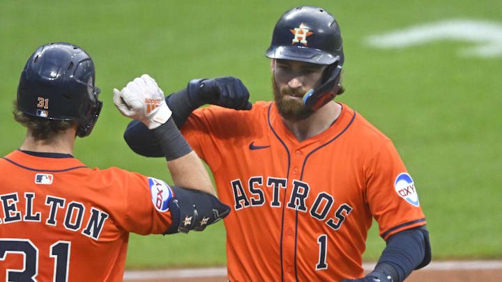 Jun 6, 2025; Cleveland, Ohio, USA; Houston Astros second baseman Brendan Rodgers (1) celebrates his solo home run with center fielder Jacob Melton (31) in the sixth inning against the Cleveland Guardians at Progressive Field. 