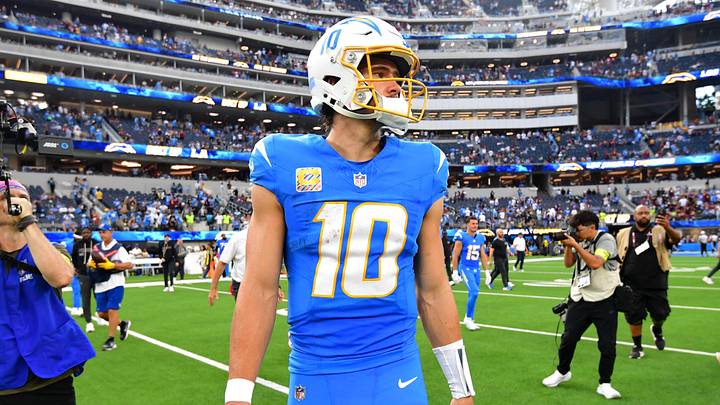 Oct 5, 2025; Inglewood, California, USA; Los Angeles Chargers quarterback Justin Herbert (10) reacts after the game against the Washington Commanders at SoFi Stadium. Mandatory Credit: Gary A. Vasquez-Imagn Images