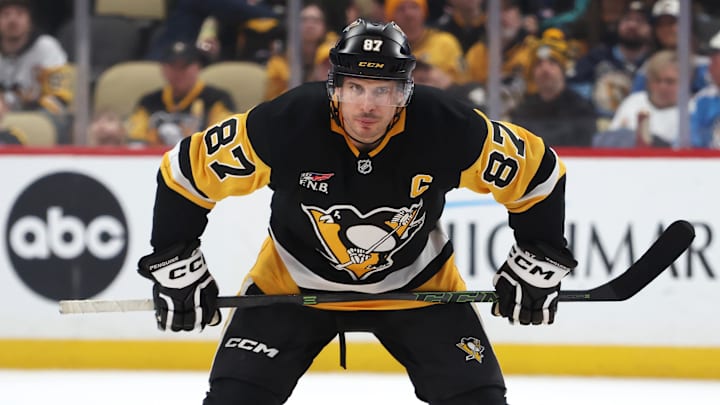 Jan 31, 2026; Pittsburgh, Pennsylvania, USA;  Pittsburgh Penguins center Sidney Crosby (87) prepares to take a face-off against the New York Rangers during the third period at PPG Paints Arena. Mandatory Credit: Charles LeClaire-Imagn Images