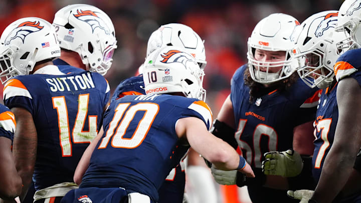 Dec 2, 2024; Denver, Colorado, USA; Denver Broncos quarterback Bo Nix (10) huddles with teammates in the second half against the Cleveland Browns at Empower Field at Mile High. 