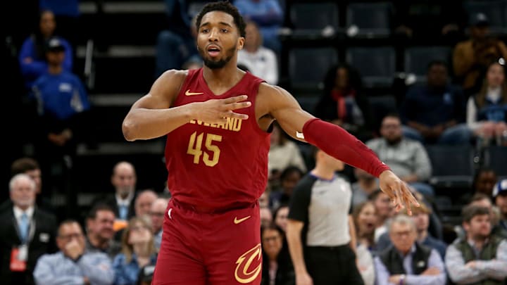 Feb 1, 2024; Memphis, Tennessee, USA; Cleveland Cavaliers guard Donovan Mitchell (45) reacts after a three point basket during the second half against the Memphis Grizzlies at FedExForum. Mandatory Credit: Petre Thomas-Imagn Images