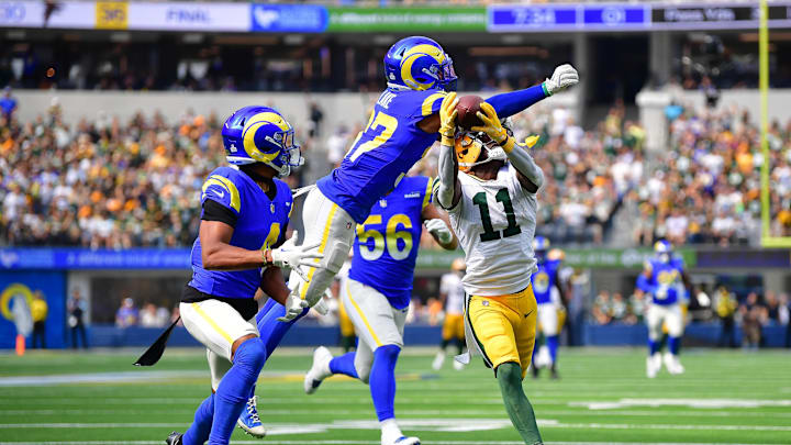 Green Bay Packers wide receiver Jayden Reed (11) catches a pass against Los Angeles Rams safety Quentin Lake (37) to set up a touchdown.